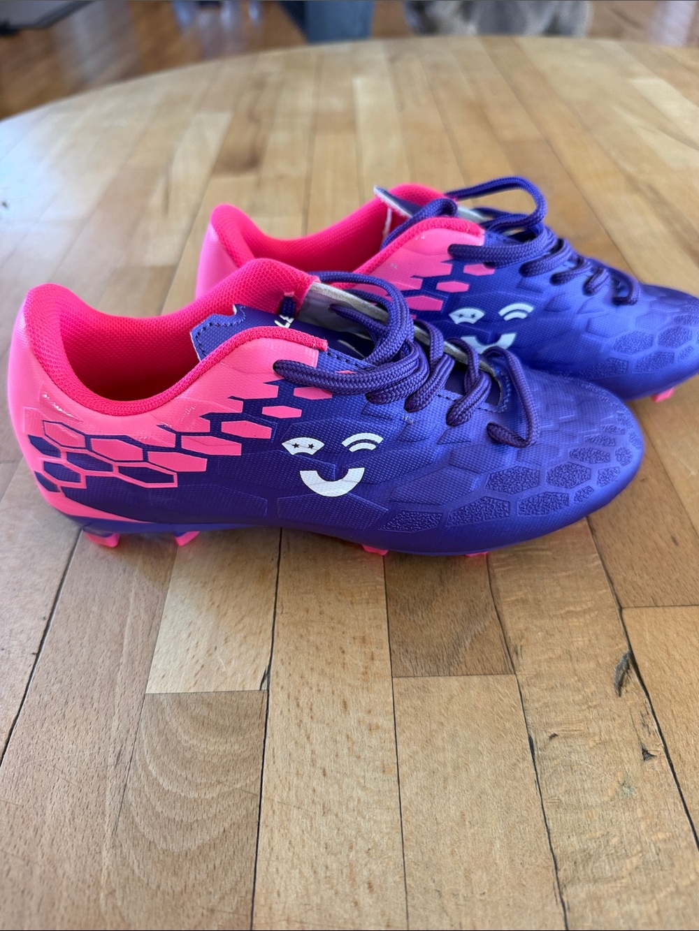 Source Unknown Purple and Hot Pink Kids Soccer Cleats with Smile Graphic